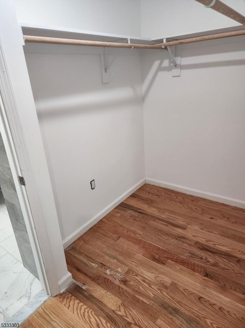 20 Garibaldi Avenue Newark, NJ 07114 - Photo 11 of 12 a view of a room with wooden floor