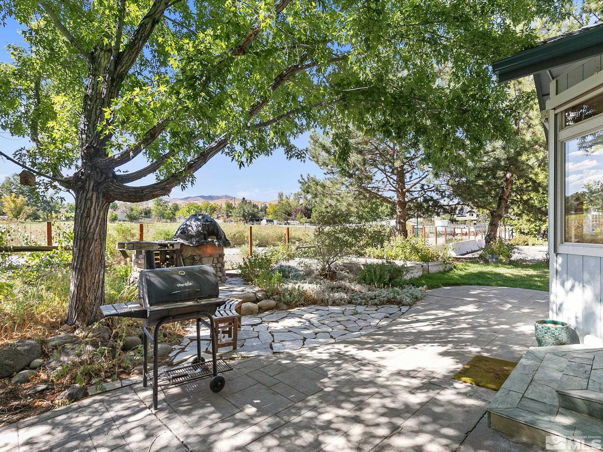 1595 Alturas Avenue Reno, NV 89503 - Photo 33 of 38 a view of a bench in the garden