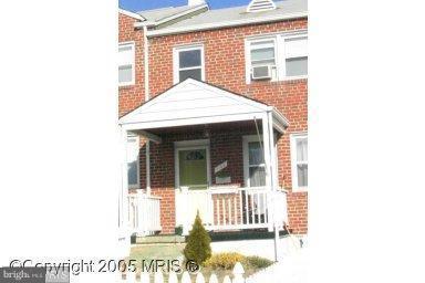 1132 Elm Road Baltimore, MD 21227 - Photo 3 of 27 a view of a house with a porch