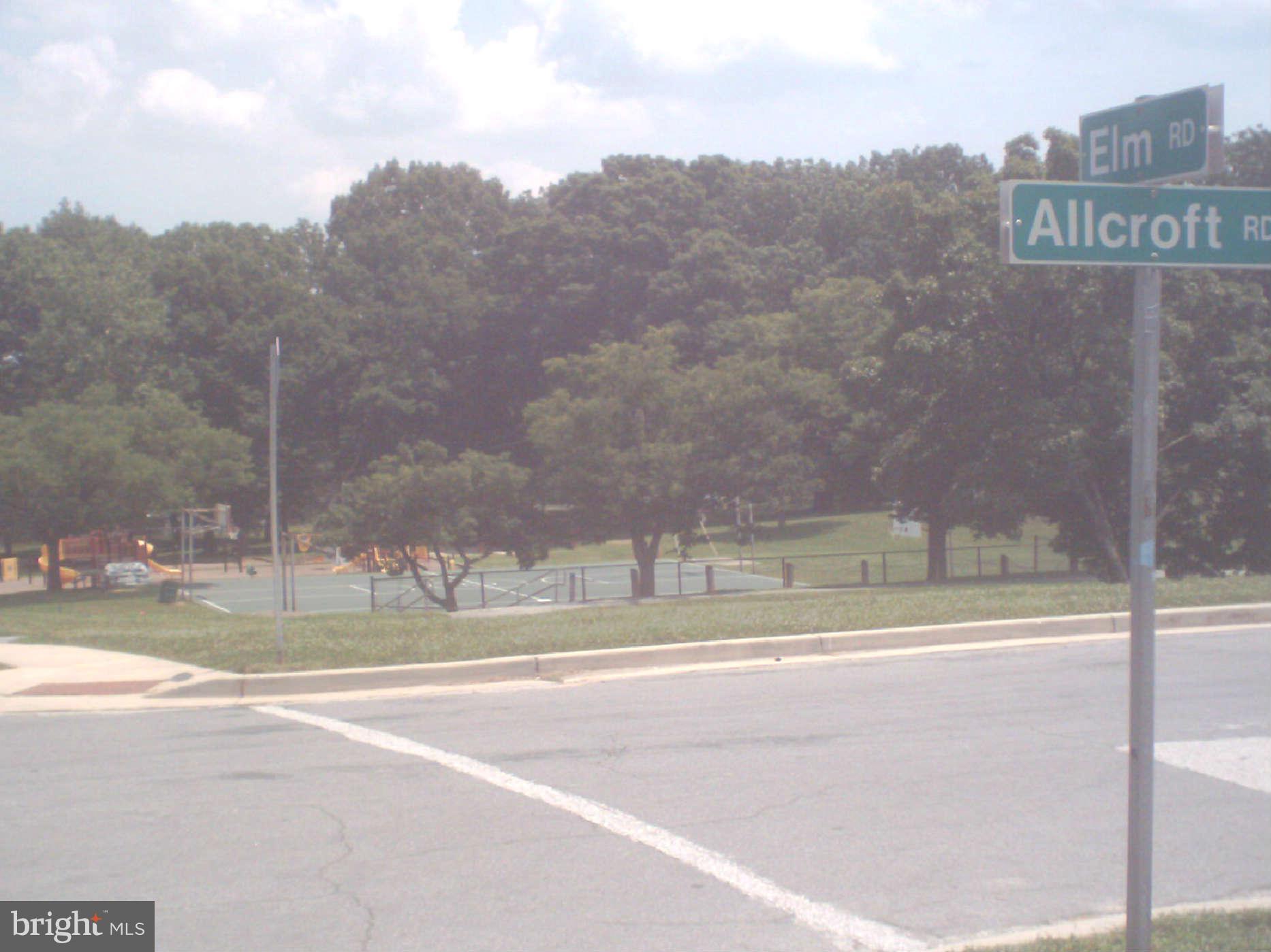 1132 Elm Road Baltimore, MD 21227 - Photo 25 of 27 a view of a road with a building in the background