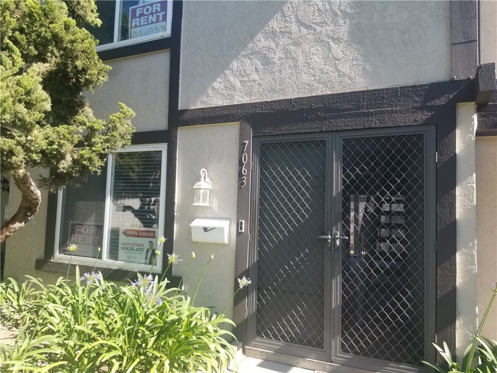 7063 Hampton Way Stanton, CA 90680 - Photo 1 of 1 a front view of a house