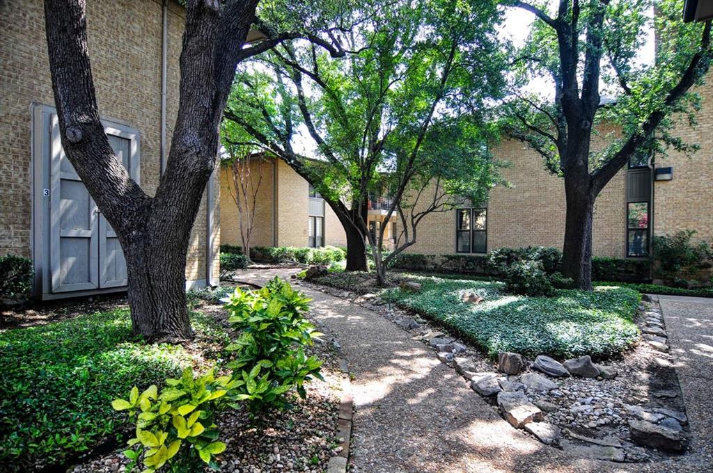 10757 Villager Road, Unit B Dallas, TX 75230 - Photo 28 of 36 Beautifully landscaped grounds throughout the community