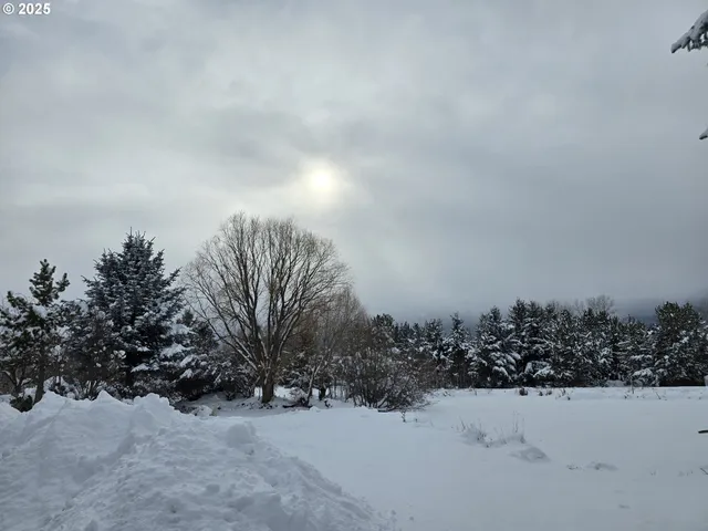 a view of a terrace with a wooden fence