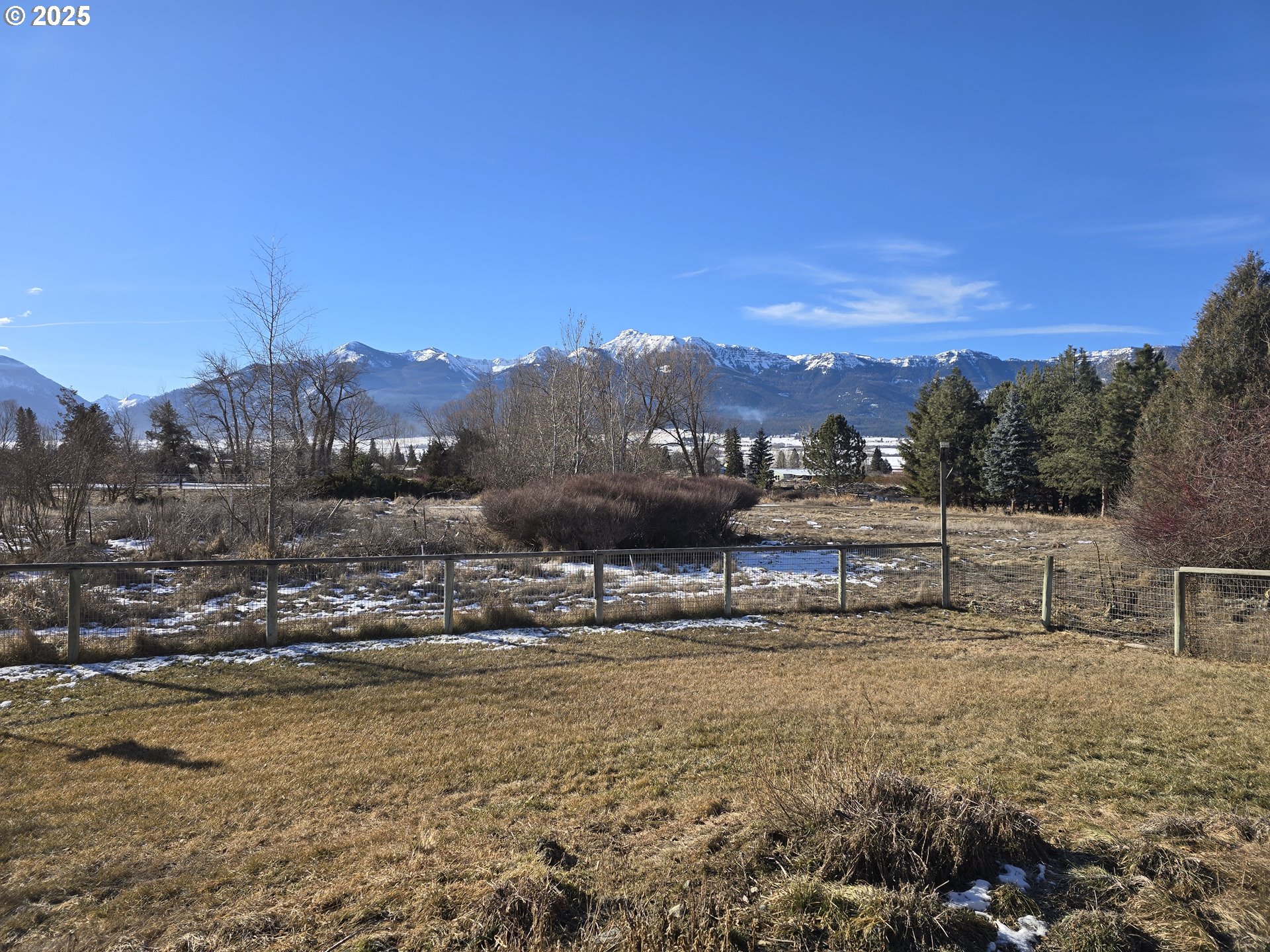 118 Fish Hatchery Lane Enterprise, OR 97828 - Photo 5 of 25 a view of a town with mountains in the background