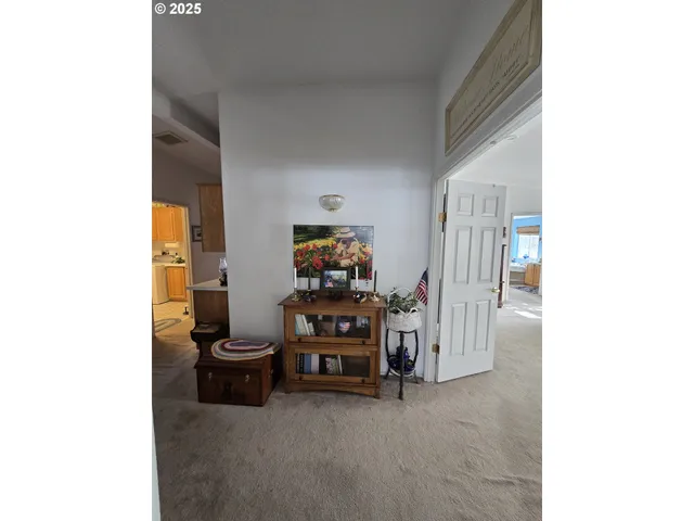 a kitchen with a sink a stove and cabinets