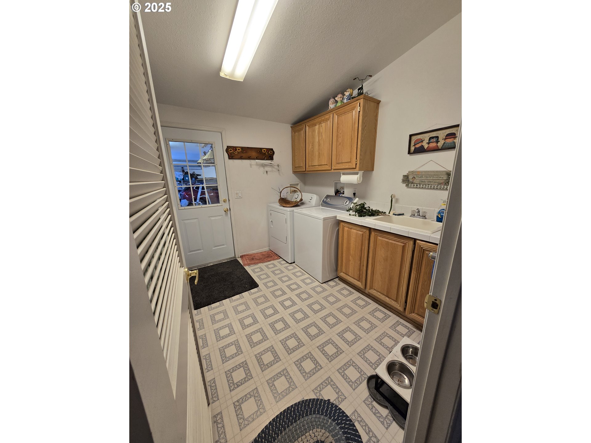 118 Fish Hatchery Lane Enterprise, OR 97828 - Photo 8 of 25 a kitchen with a sink a stove and cabinets