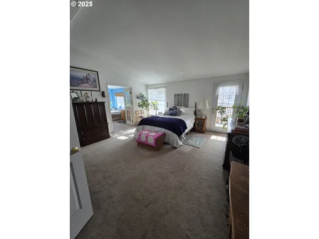 a kitchen with a table chairs stove and microwave