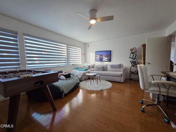 a hallway with a large closet