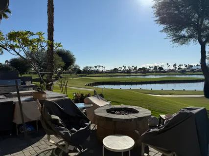 a view of a chairs and table on the terrace