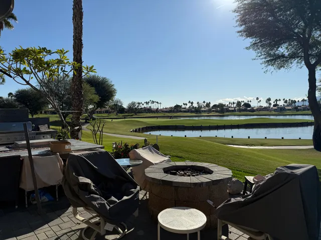 a view of a chairs and table on the terrace