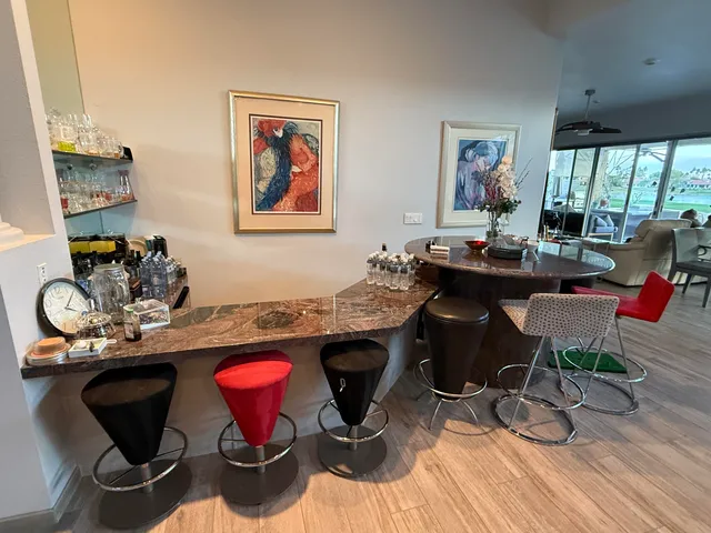 a view of a living room and dining room