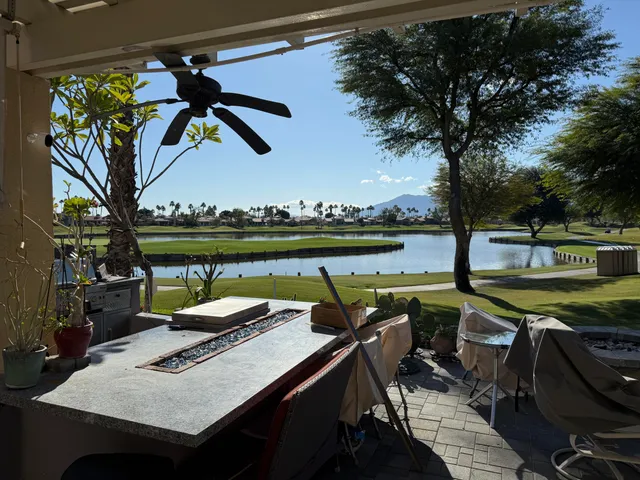 a view of a chairs and table on the terrace