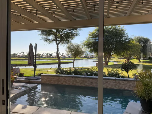 a view of a lake from a balcony