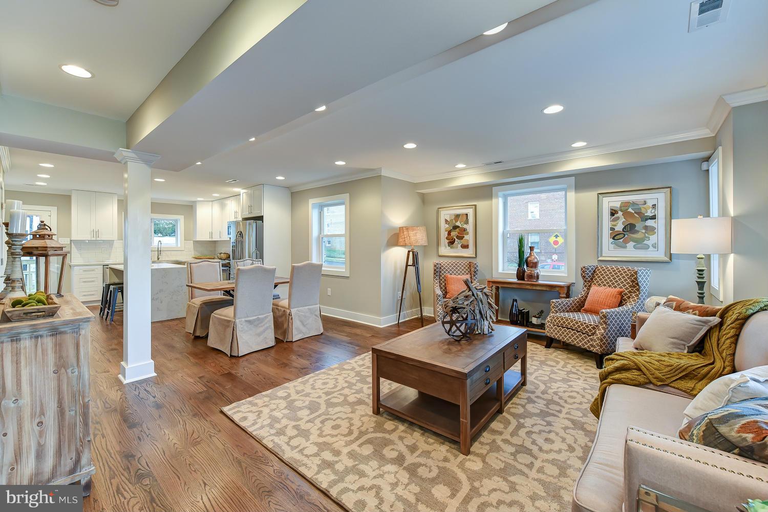 a living room with furniture and a table