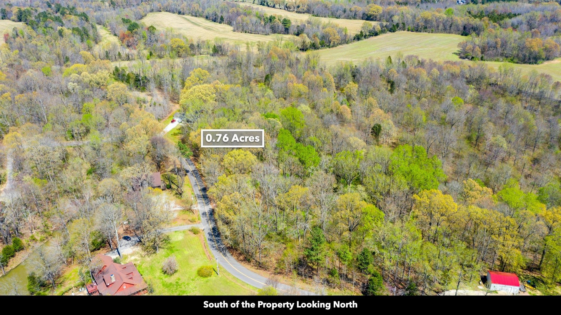 -lot 20 Lake Hayes Estate Road Trenton, TN 38382 - Photo 15 of 34 a sign that is sitting on a brick wall