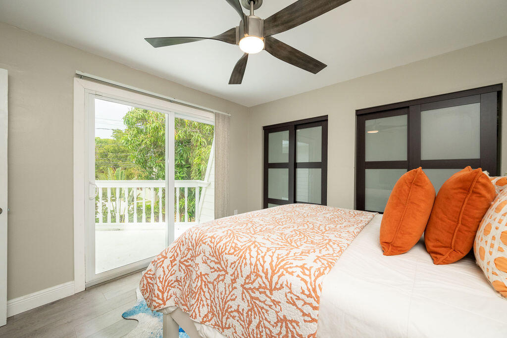 3246 Duck Avenue Key West, FL 33040 - Photo 14 of 21 a bedroom with a bed and window