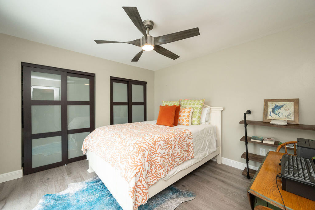 3246 Duck Avenue Key West, FL 33040 - Photo 15 of 21 a bedroom with a bed and window