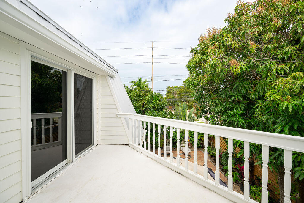 3246 Duck Avenue Key West, FL 33040 - Photo 16 of 21 a balcony with an outdoor space