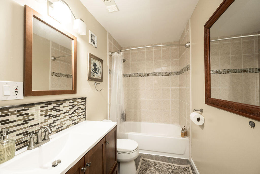 3246 Duck Avenue Key West, FL 33040 - Photo 2 of 21 a bathroom with a sink a toilet and shower
