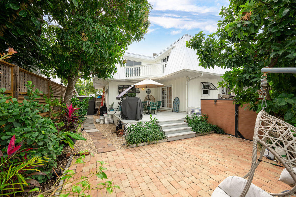 3246 Duck Avenue Key West, FL 33040 - Photo 6 of 21 a front view of a house with garden