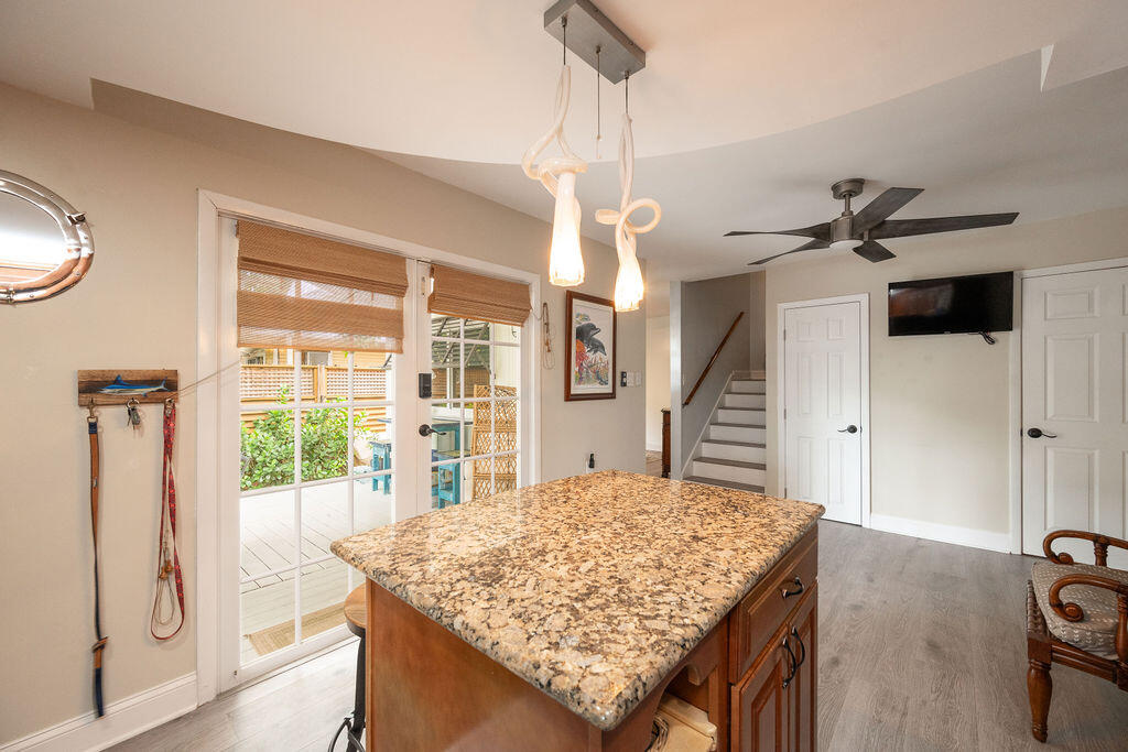 3246 Duck Avenue Key West, FL 33040 - Photo 10 of 21 a room with a table and a chandelier