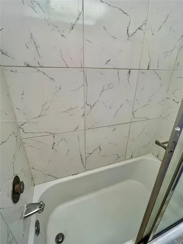 a bathroom with a bathtub