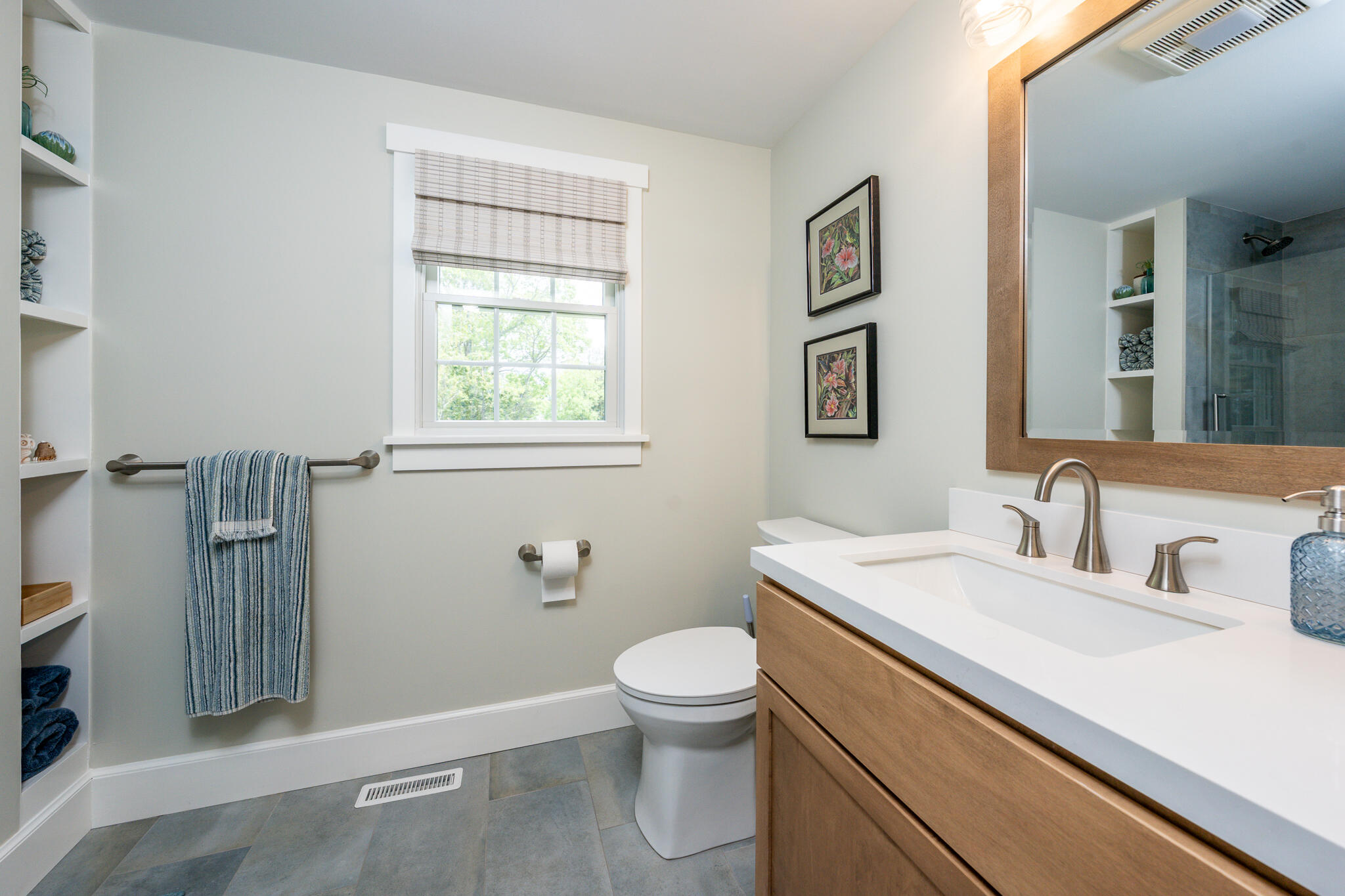 61 Angus Way Centerville, MA 02632 - Photo 31 of 59 a bathroom with a granite countertop toilet a sink and a mirror