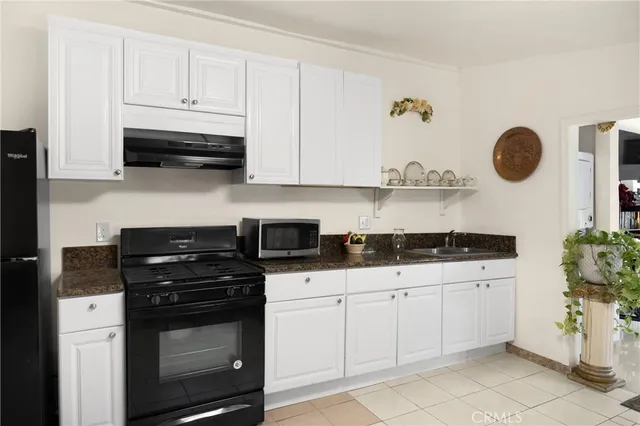 a view of a dining room kitchen and a sink