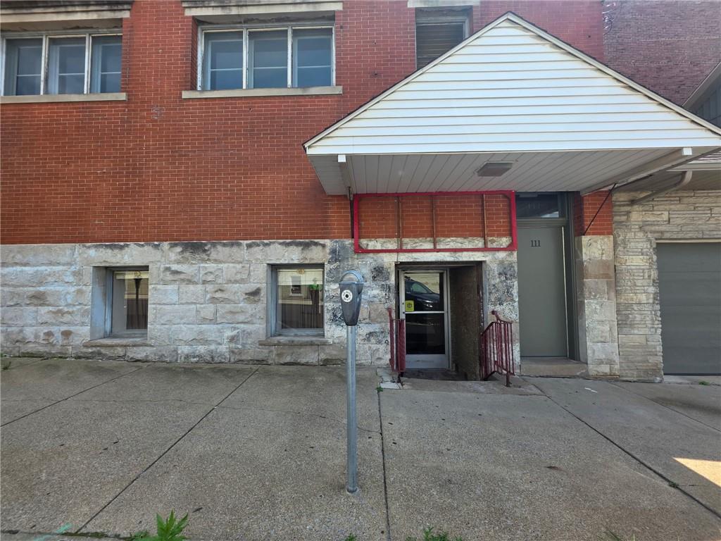 a front view of a house with garage