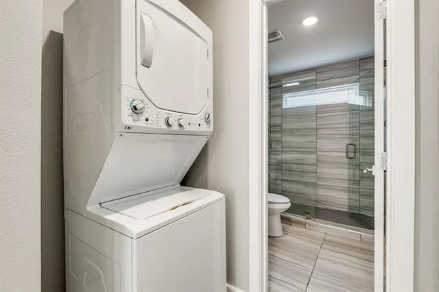 a view of bathroom with a toilet and a shower