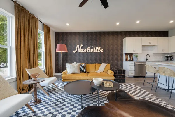 a living room with furniture and a window