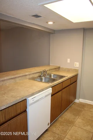 a utility room with washer and dryer
