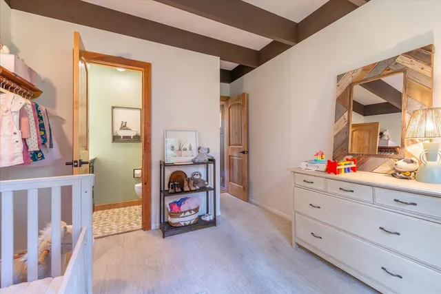 a bedroom with a bed and a cabinets