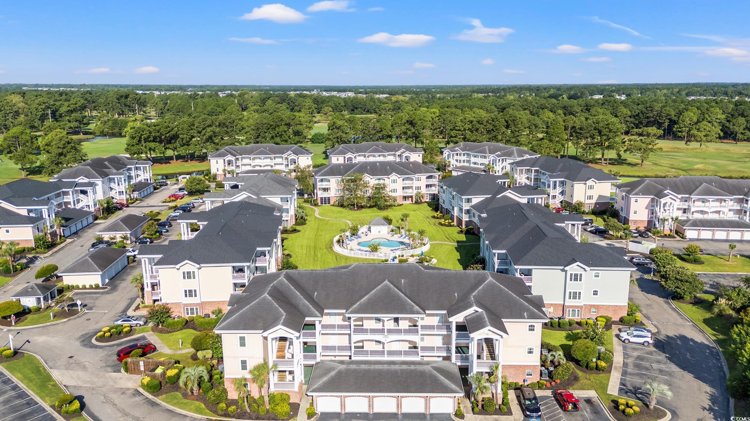 4864 Carnation Circle, Unit 304 Myrtle Beach, SC 29577 - Photo 33 of 36 Bird's eye view of a tree filled landscape