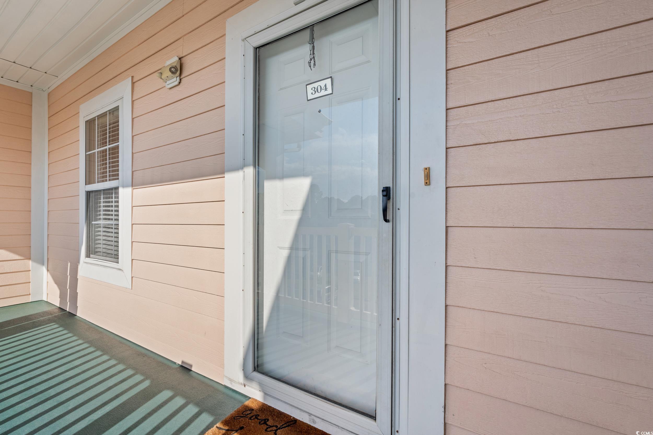 4864 Carnation Circle, Unit 304 Myrtle Beach, SC 29577 - Photo 4 of 36 Doorway to property
