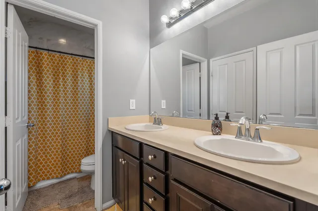 a bathroom with a shower and a shower