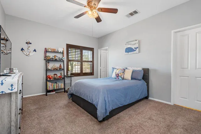 a view of a swimming pool with a lounge chairs