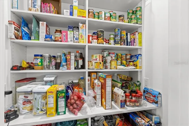a view of an chairs and tables in the balcony