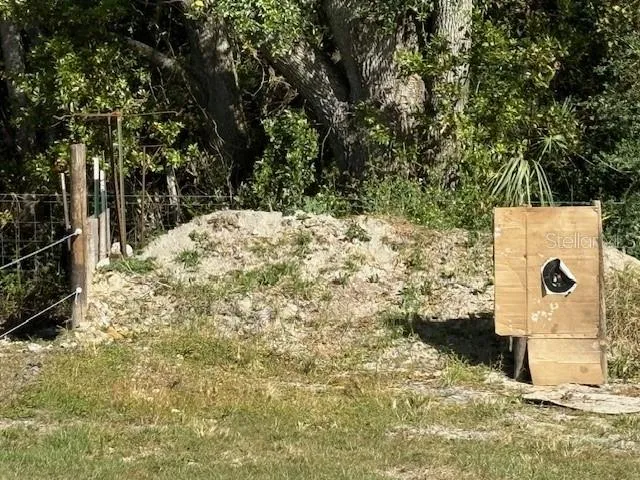 a view of a garden with a lake