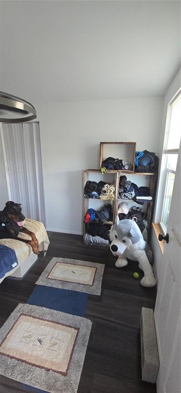 206 Lake Ida Road Frostproof, FL 33843 - Photo 23 of 46 a bedroom with a bed and a dresser