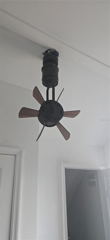 206 Lake Ida Road Frostproof, FL 33843 - Photo 37 of 46 a lamp on a white wall