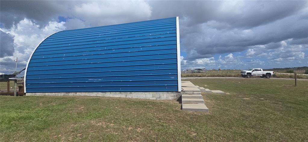 206 Lake Ida Road Frostproof, FL 33843 - Photo 5 of 46 a view of a backyard