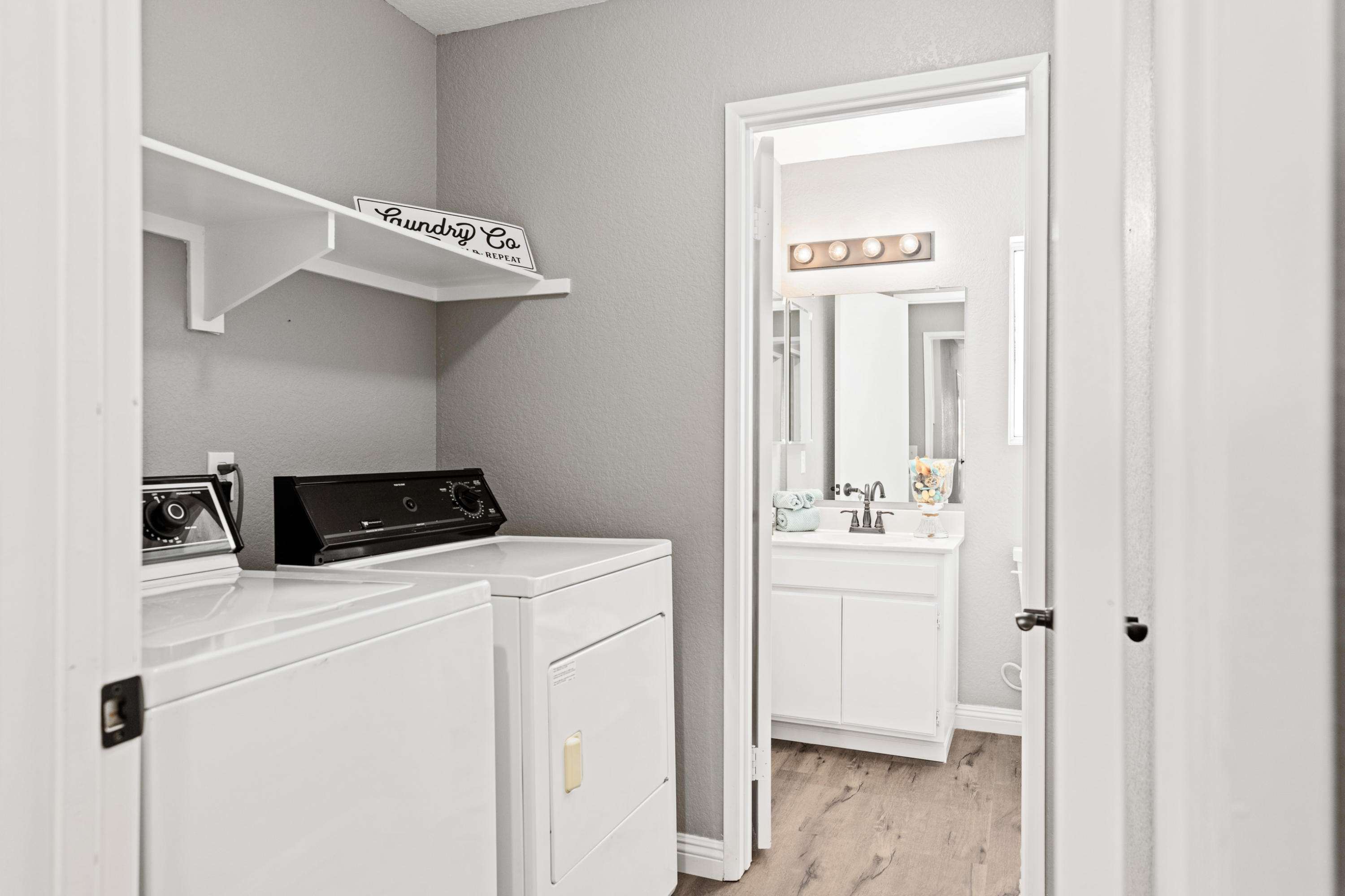 40325 Argyle Lane Palmdale, CA 93551 - Photo 14 of 24 a utility room with dryer and washer