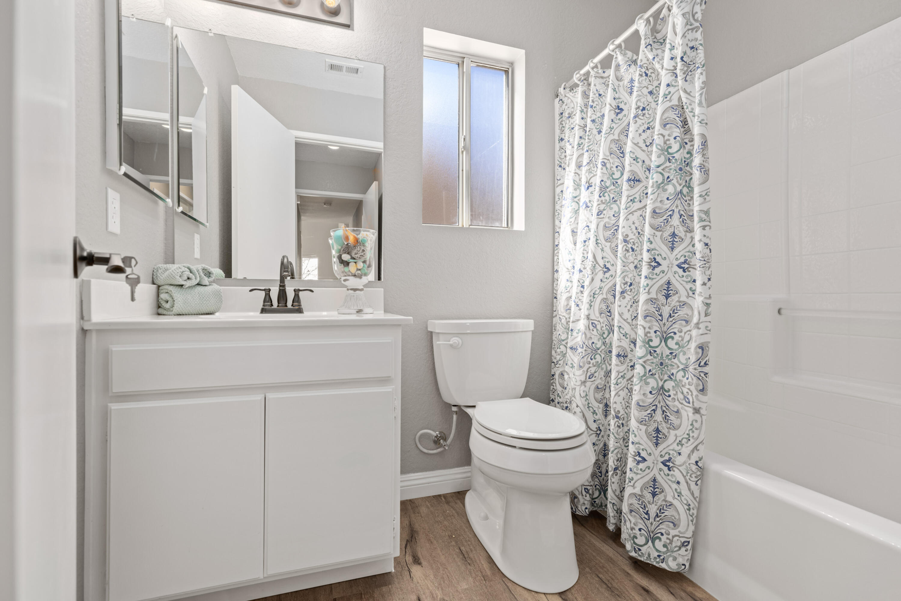 40325 Argyle Lane Palmdale, CA 93551 - Photo 15 of 24 a bathroom with a sink toilet and shower
