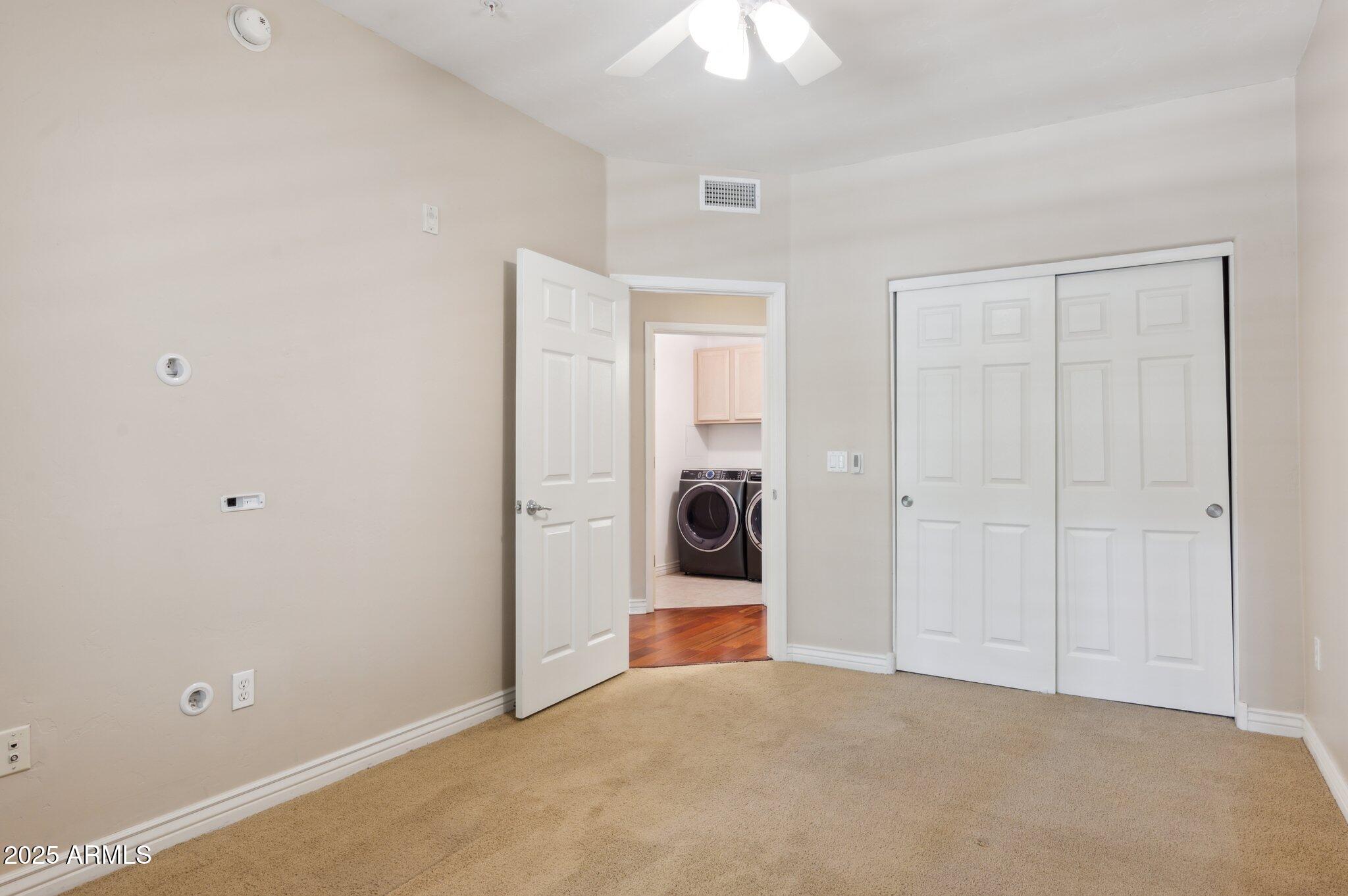 5450 East Deer Valley Drive, Unit 1214 Phoenix, AZ 85054 - Photo 15 of 35 a view of a big room with closet area