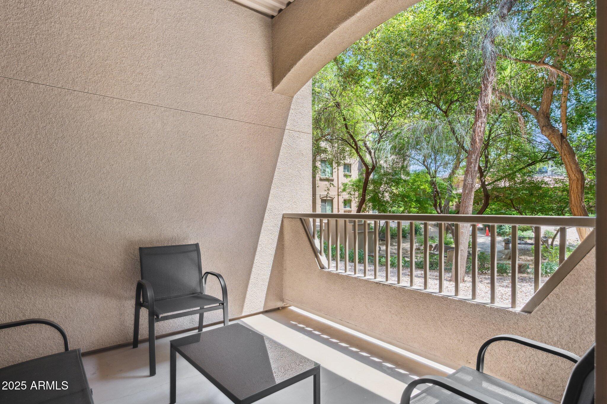 5450 East Deer Valley Drive, Unit 1214 Phoenix, AZ 85054 - Photo 3 of 35 a view of a chair in a balcony