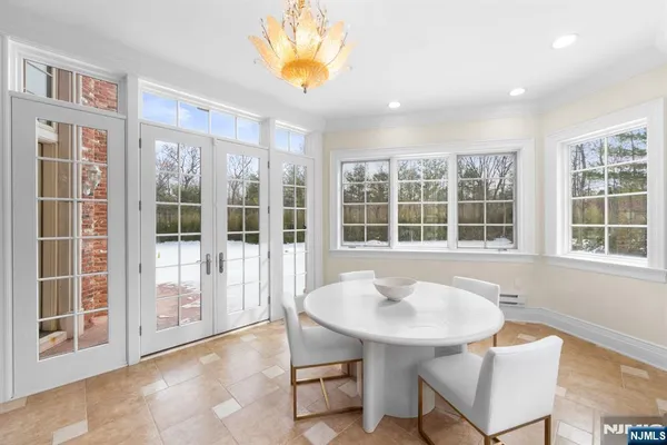 a view of a livingroom with furniture and window