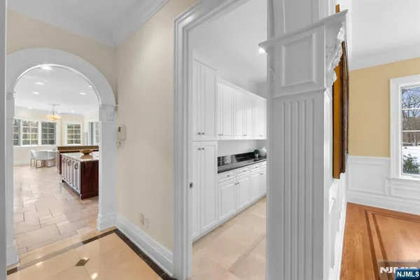 a kitchen with cabinets and a stove