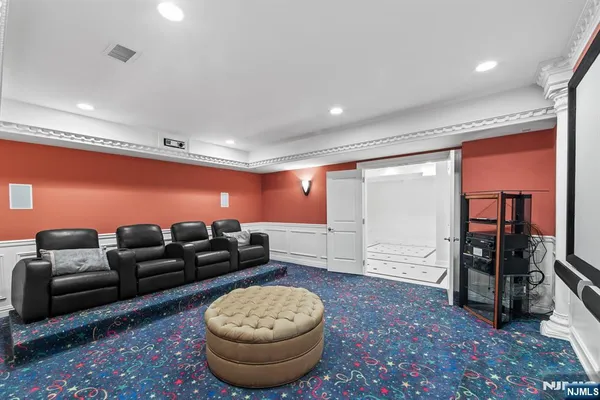 a living room with furniture and a rug