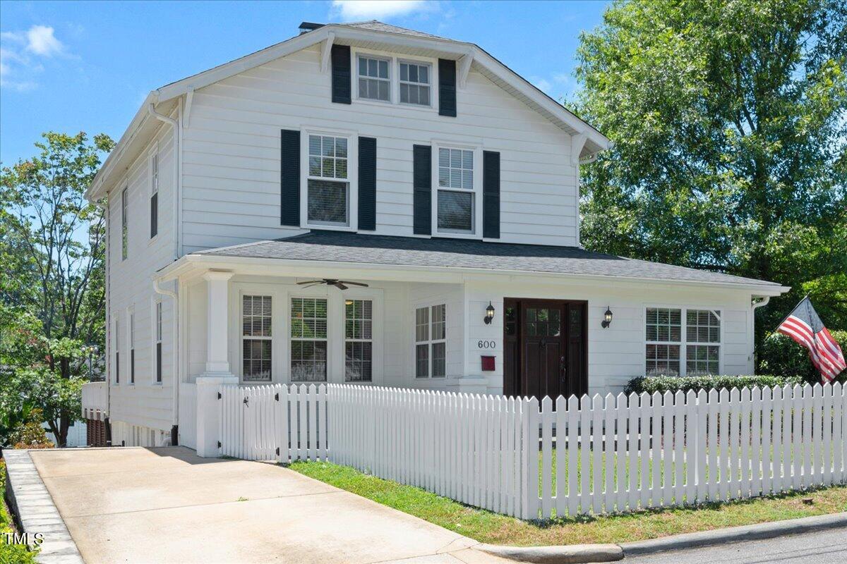 600 Harding Street Raleigh, NC 27604 - Photo 1 of 33 a front view of a house with a garden